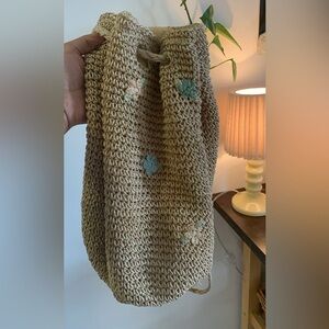 Woven backpack with Floral Accents
